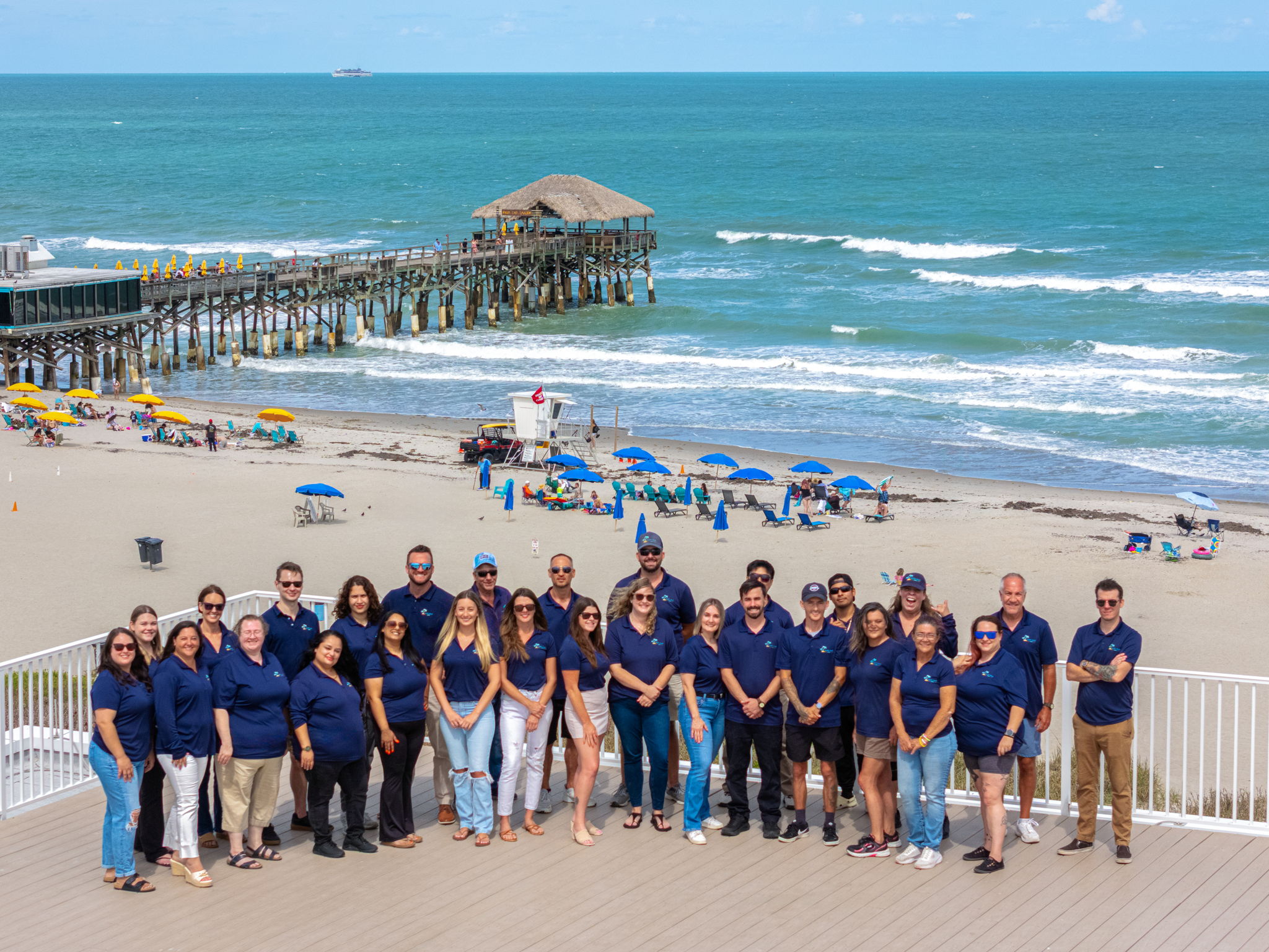 The Happy Palm Stays team on the Space Coast at Cocoa Beach Pier